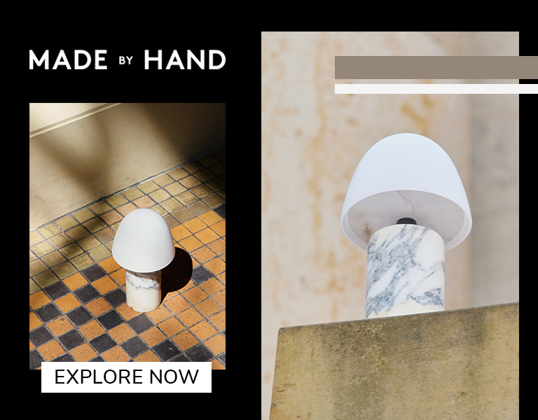 Made by Hand FUSE lamp with white dome shade and marble base shown in natural light on tiled and stone surfaces, with text ‘Explore Now’.